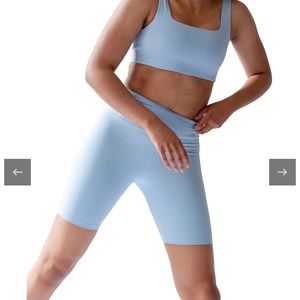 Girlfriend Collective blue rib biker shirt and top set